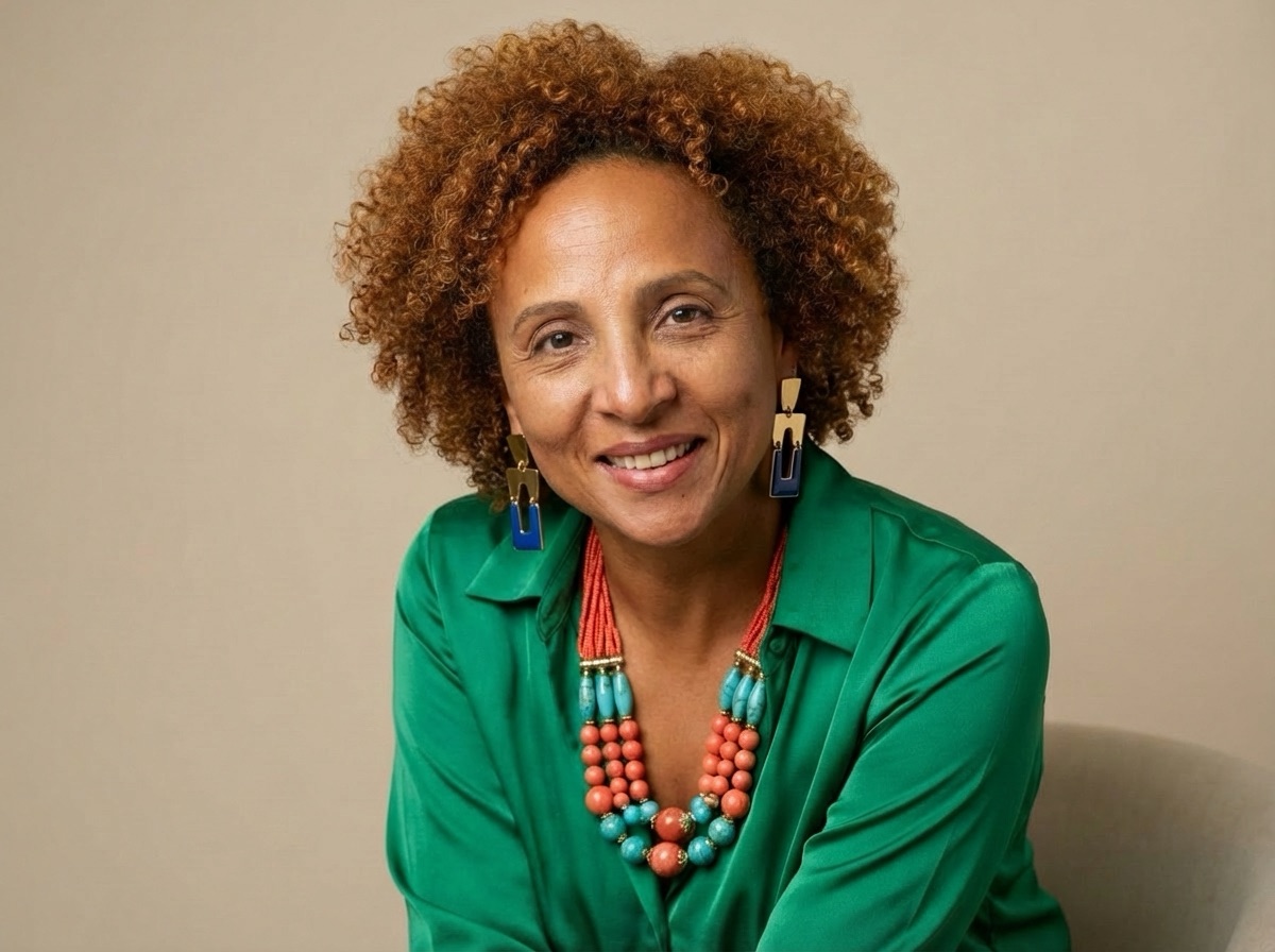 Marcia Ayacaba, executive coach, in a green shirt